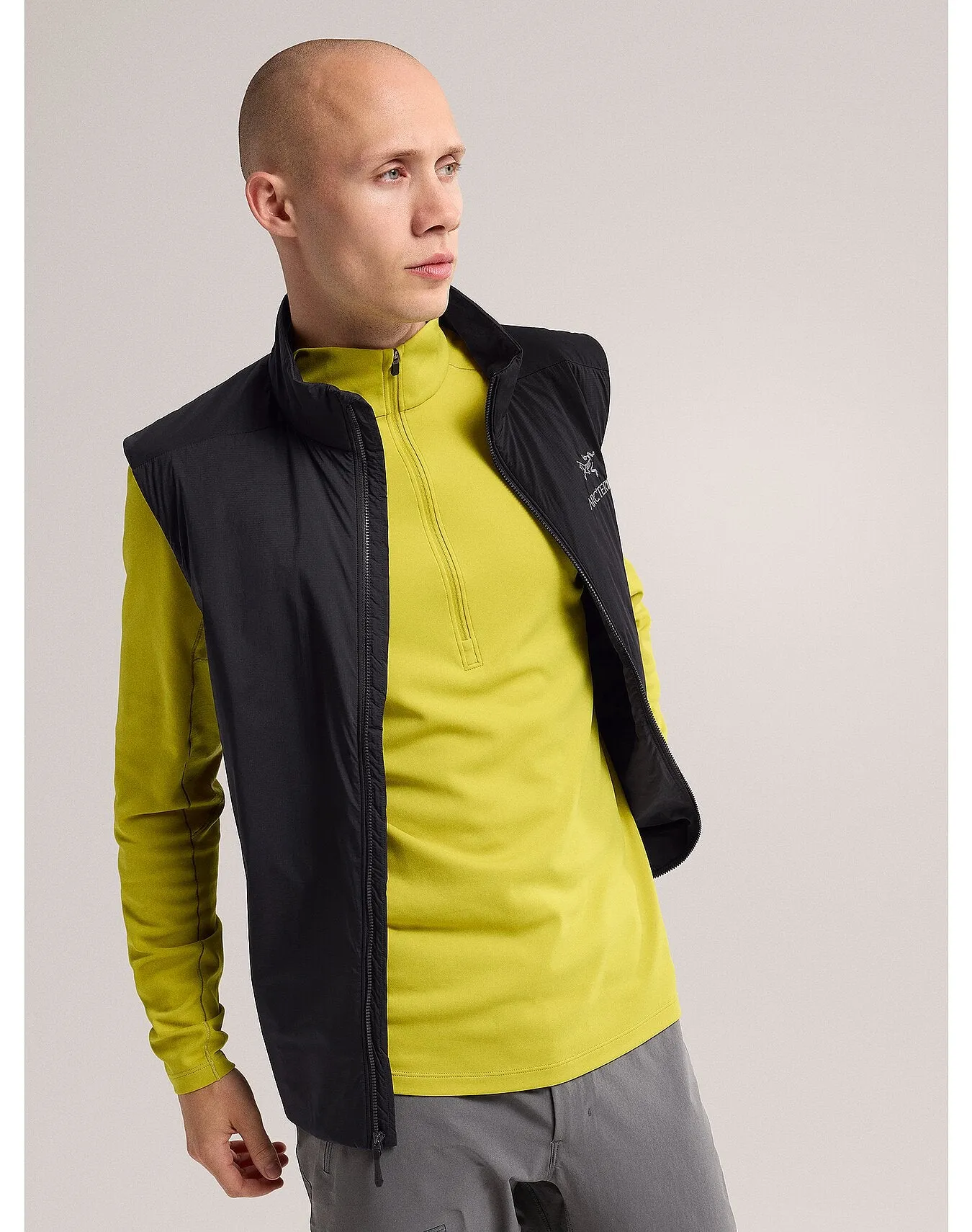 Certainly! Here’s an optimized title for the e-commerce product:

“Atom Vest for Men - Lightweight Performance Packable Vest for Athletic and Casual Wear”

Let me know if you need any further modifications!