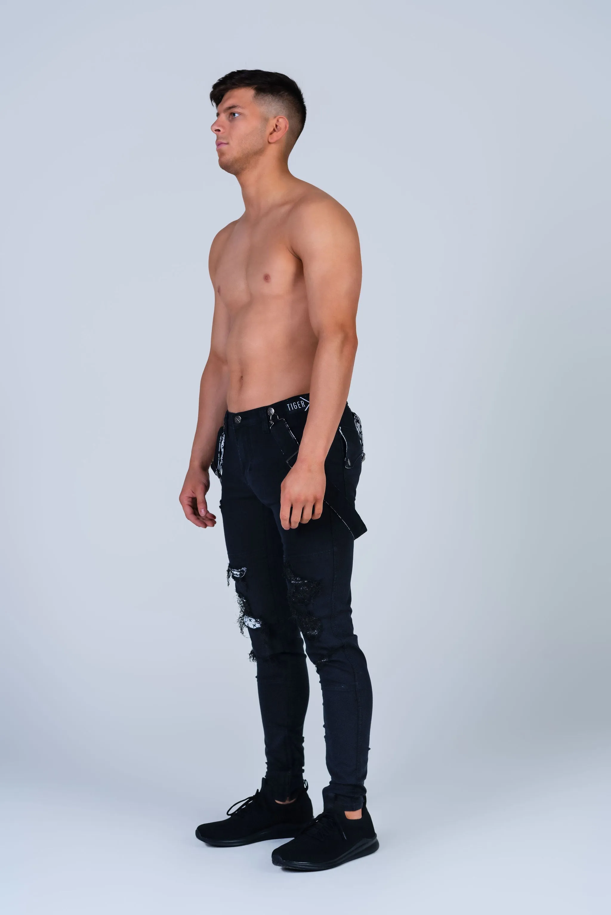 Double-Black Distressed Romey Jeans with Holes and Backing