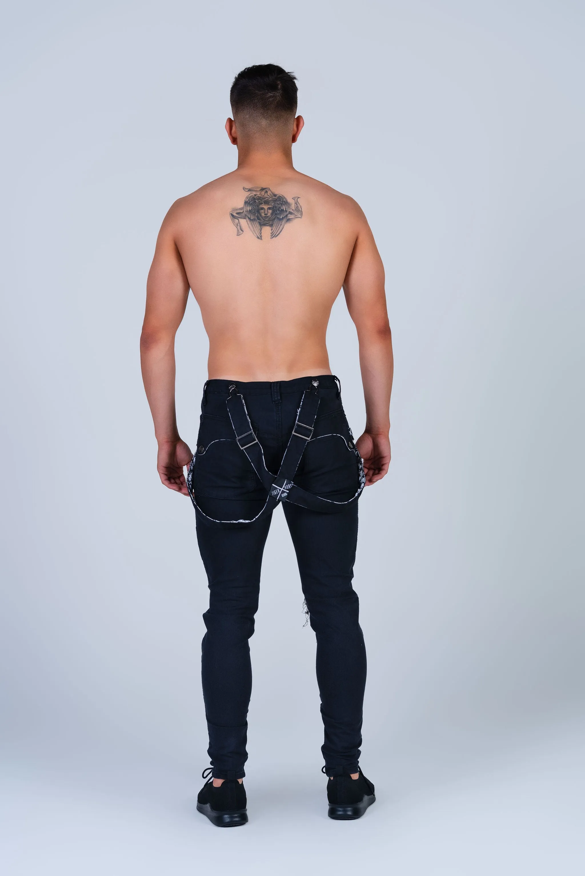 Double-Black Distressed Romey Jeans with Holes and Backing